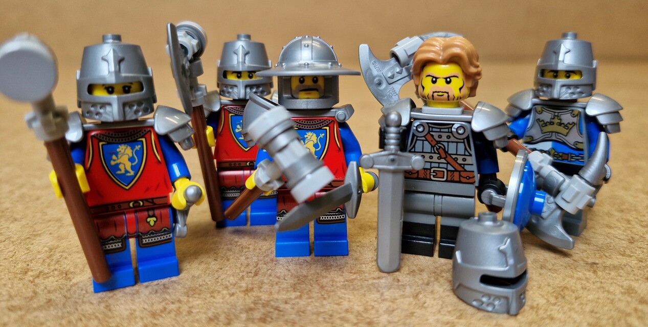 Heavy Knights with weaponsmaster Tyon and general Leoric.